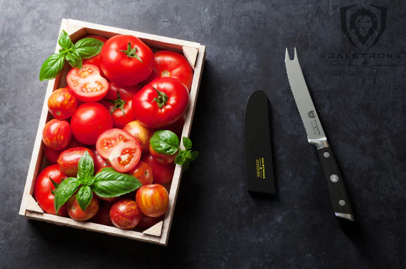 A box of fresh slices of tomatos beside the Gladiator Series | NSF Certified | Dalstrong Serrated Tomato Knife 5" 