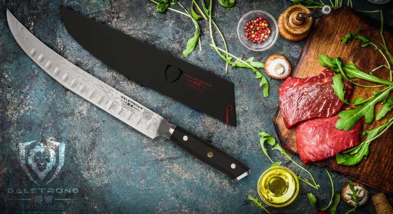 A photo of the Butcher's Breaking Cimitar Knife 10" Shogun Series ELITE Dalstrong beside a raw meat on cutting board