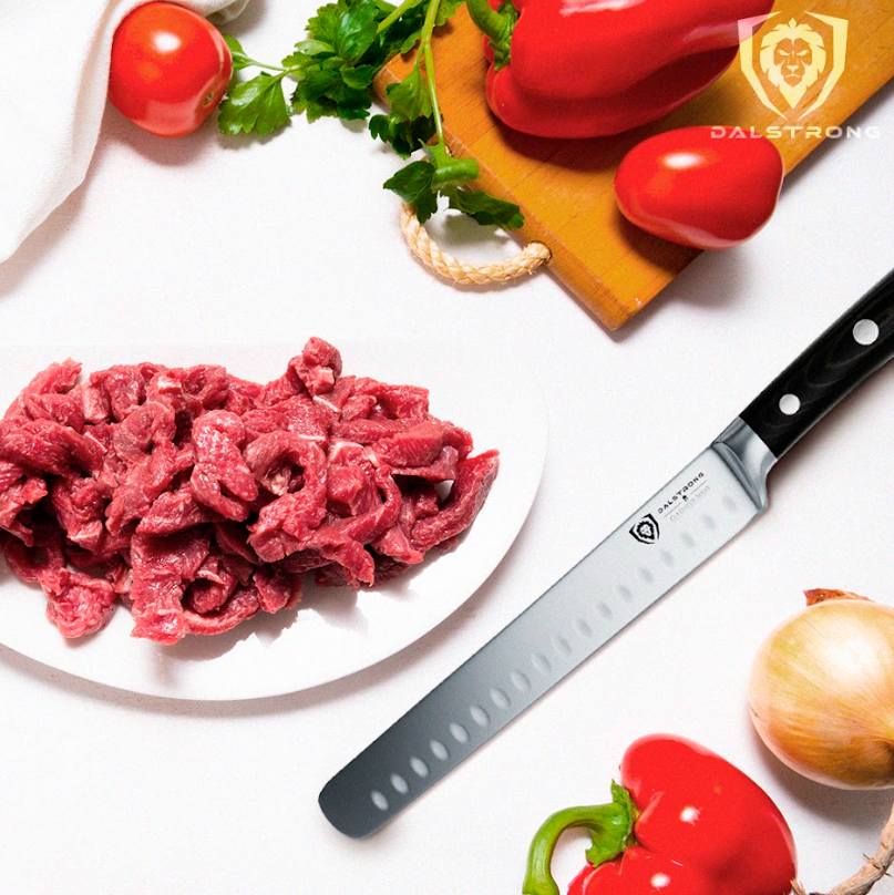 A photo of the Slicing Carving Knife 8" Gladiator Series NSF Certified Dalstrong with beef strips, tomato, bell pepper, onion at the sides