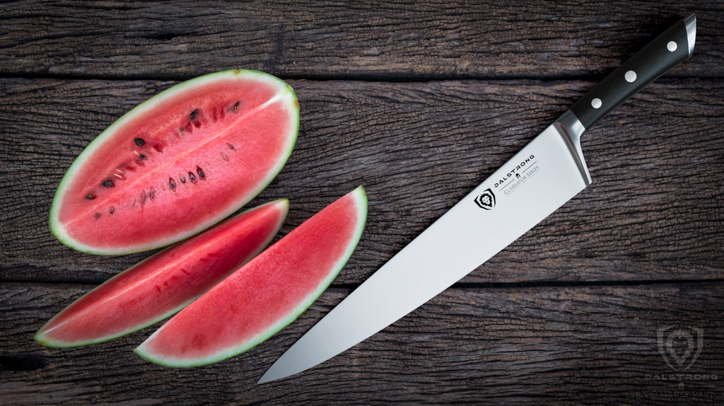 A photo of three slices of watermelon with the Chef's Knife 12" Gladiator Series | NSF Certified | Dalstrong