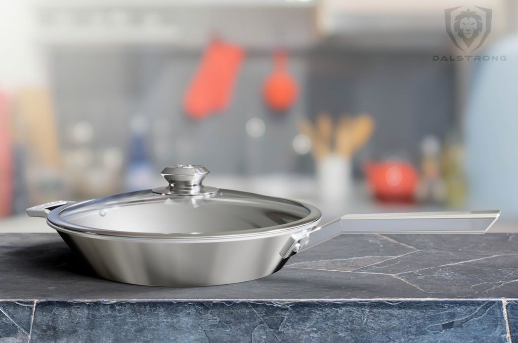 A photo of the 12" Frying Pan & Skillet Silver | Oberon Series | Dalstrong on top of a table.