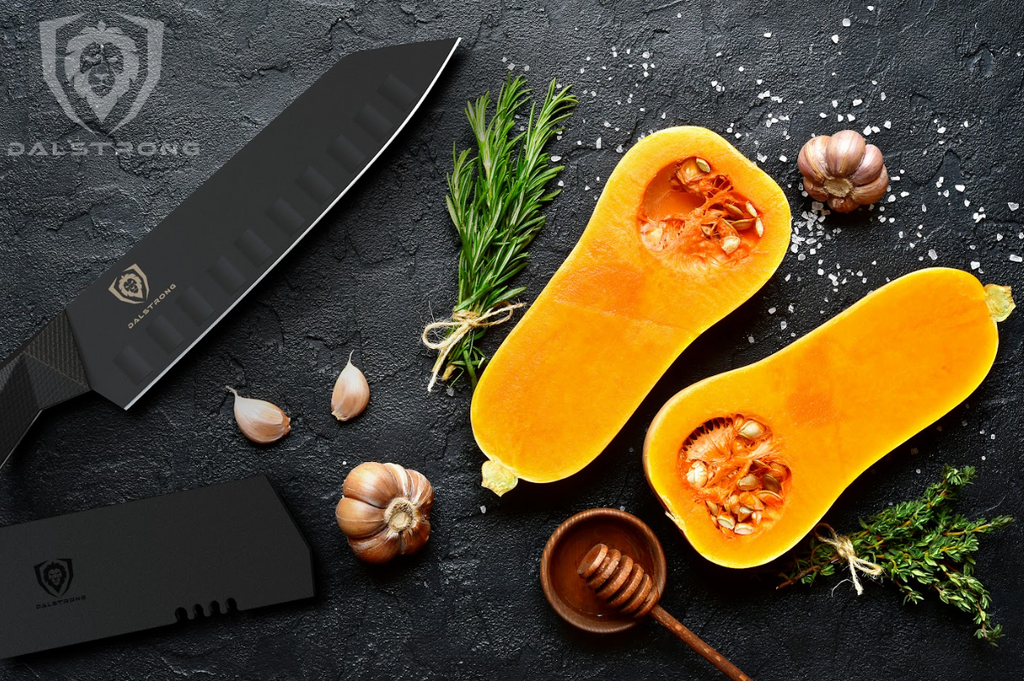 A photo of a butternut squash sliced in two with the Santoku Knife 7" Shadow Black Series NSF Certified Dalstrong