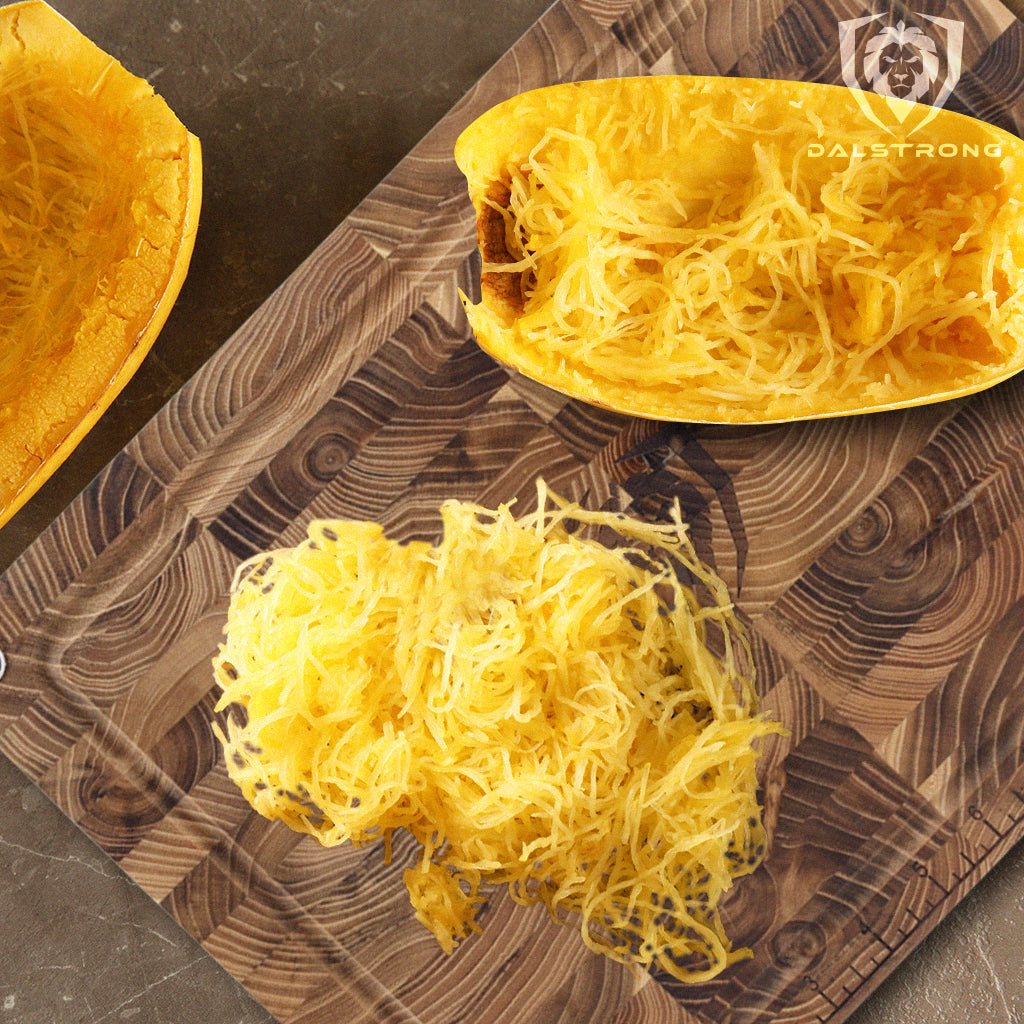 Dalstrong Teak Cutting Board with spaghetti squash on top of it