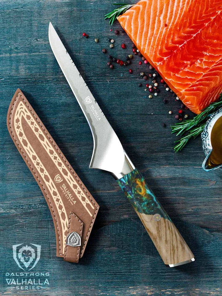 Valhalla Series Boning Knife 6" beside a fillet of salmon.