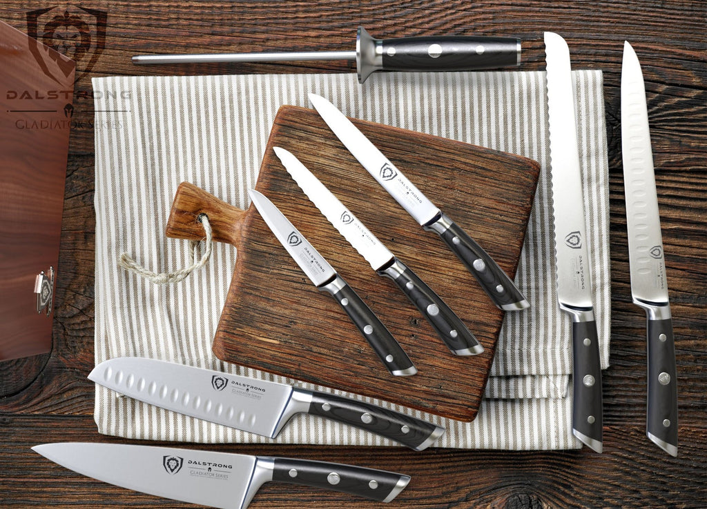 A photo of the 8-Piece Knife Block Set | Gladiator Series | Knives NSF Certified | Dalstrong on top of a table.