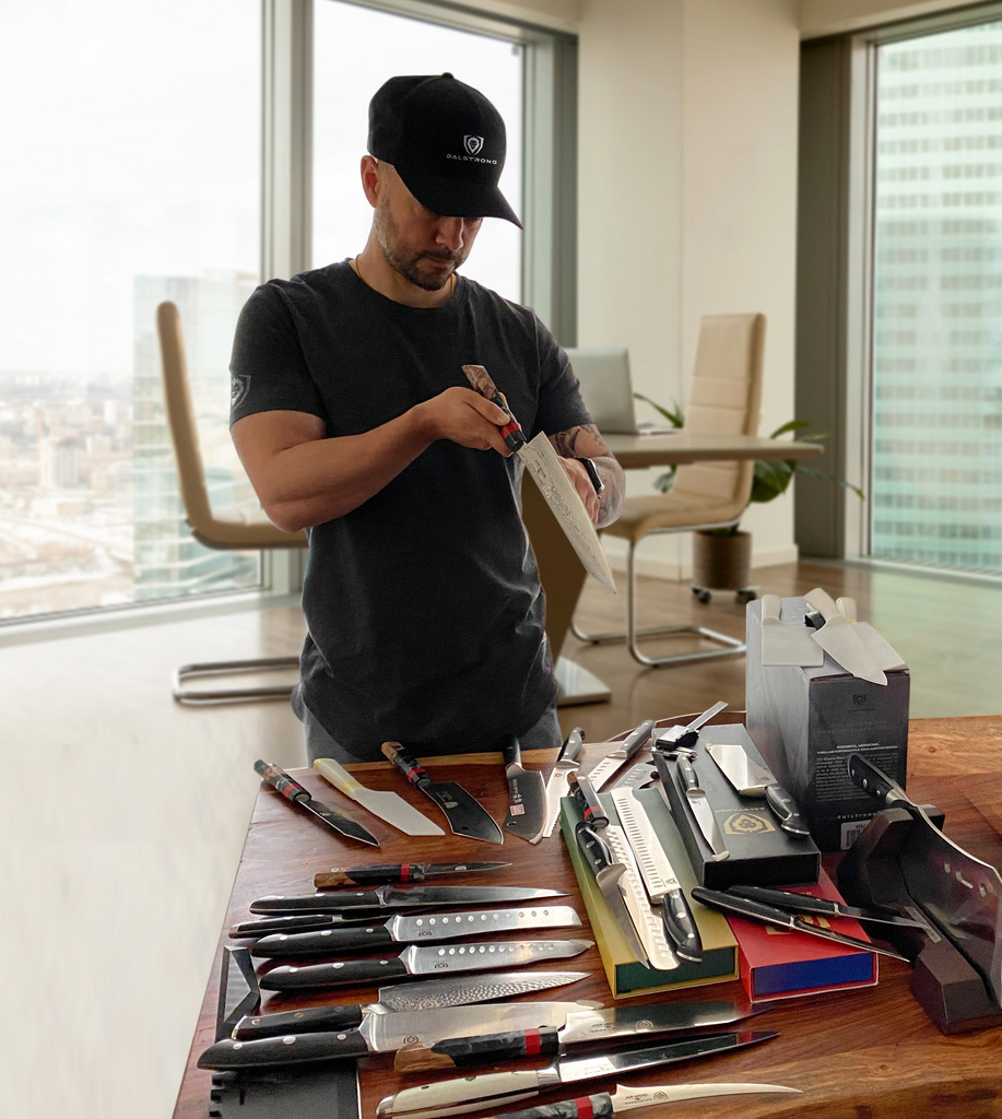 Dalstrong CEO David Dallaire inspects a kitchen knife