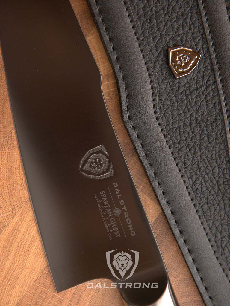 A close-up photo of the Chef's Knife 8" | Spartan Ghost Series | Dalstrong with it's sheath.