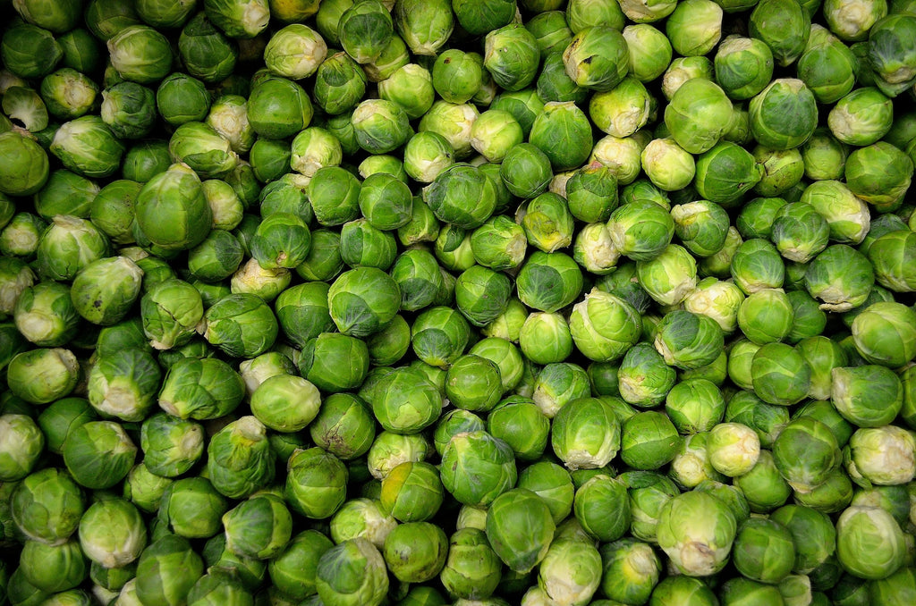 A photo of fresh dreen round brussel sprouts