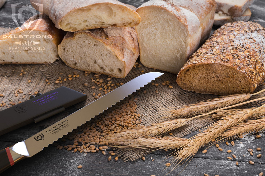 Several sliced loafs of bread next to raw seeds and stems on a wooden floor