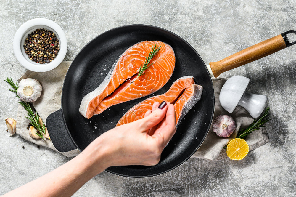 cooking fish in pan