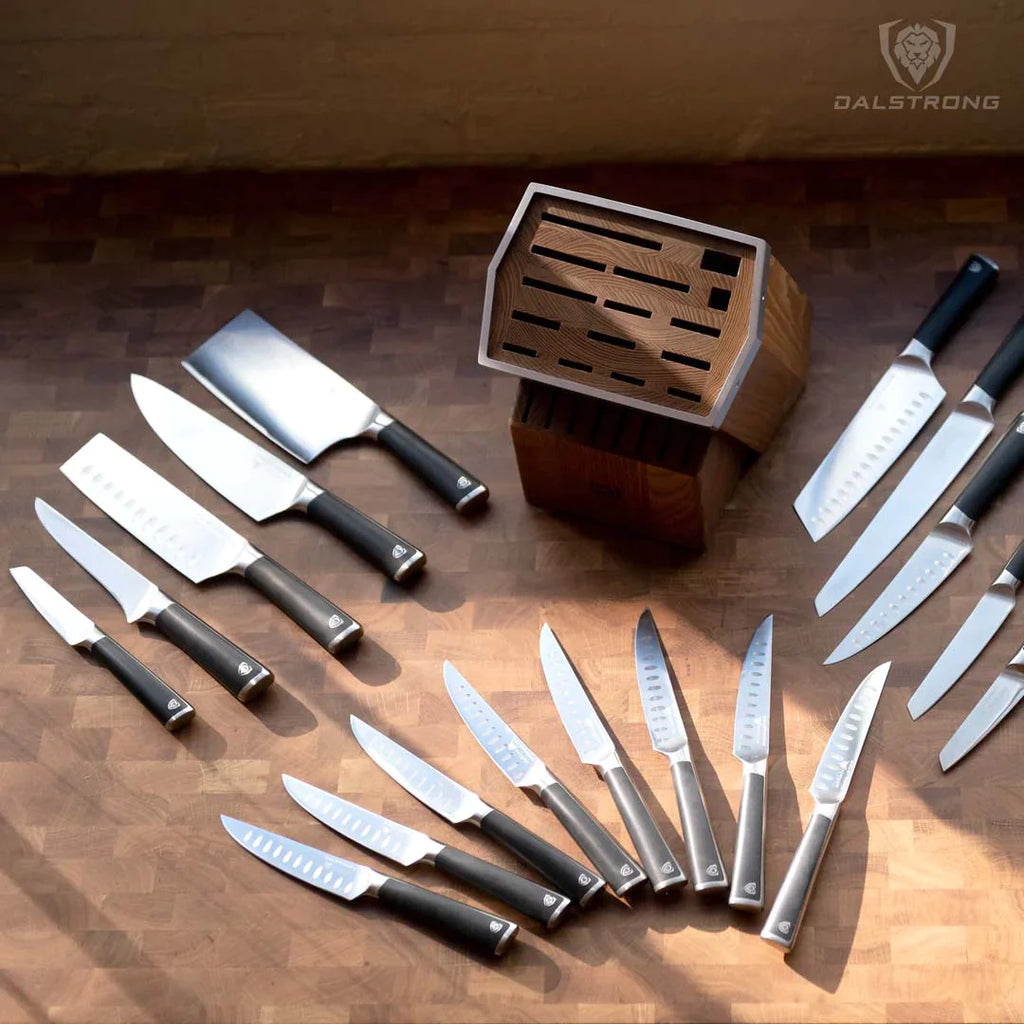 A photo of the 24-Piece Knife Block Set | Vanquish Series | NSF Certified | Dalstrong on top of a wooden board.