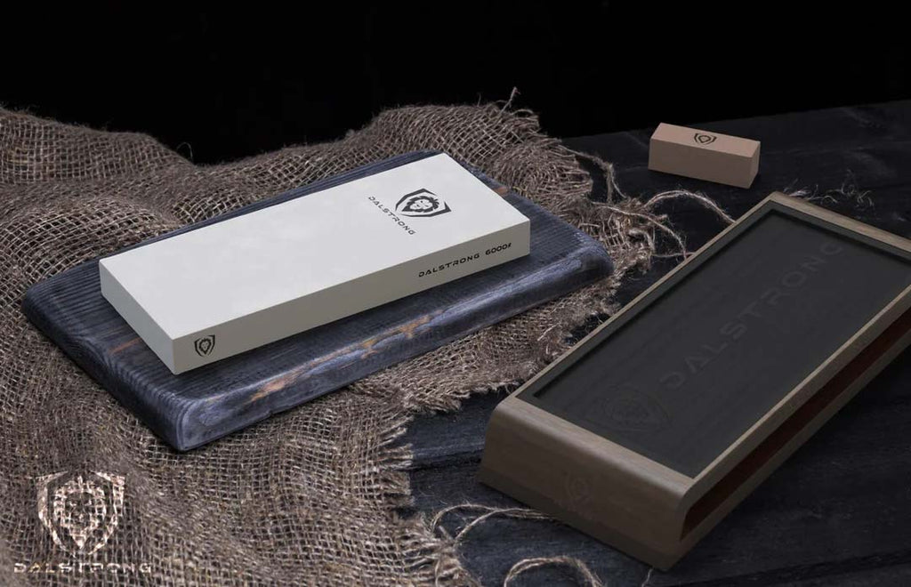 Premium Whetstone Kit #1000 / #6000 Grit with Nagura Stone & Rust Erase on a black table.