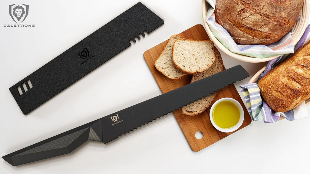 Dalstrong Shadow Black Series bread knife and its sheath next to slices and loafs of bread on a wooden cutting board.