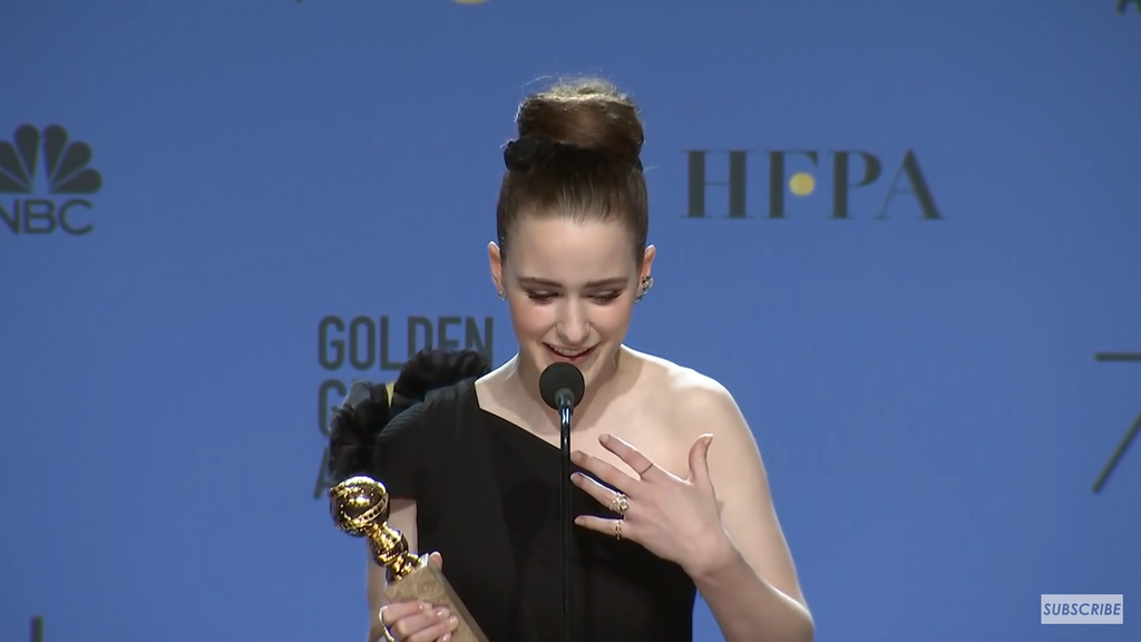 Rachel Brosnahan at Golden Globes Red Carpet Wearing Shiffon Co Duet Pinky Ring Jewelry