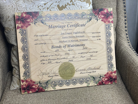 Marriage certificate printed on wood by The Broken Plank.