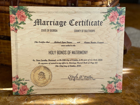 A beautiful marriage certificate printed on wood by The Broken Plank.