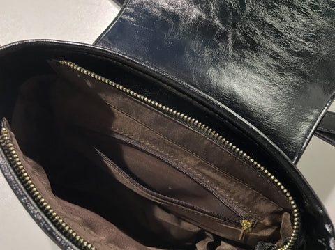 Inside of saddlebag with zipper pocket