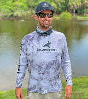 Josh Jorgensen showing the new BlacktipH Mossy Oak Limited Edition Shirt in White