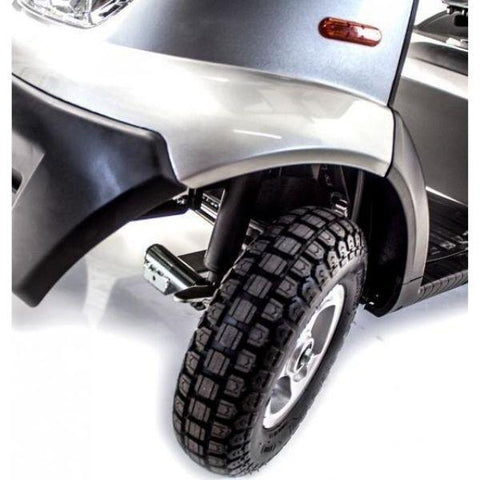 A front wheel view of the Afikim Afiscooter S 4-wheel scooter, showcasing its sleek design and sturdy construction.