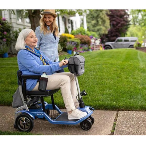 Lady riding the So Lite lightweight scooter Right Side View