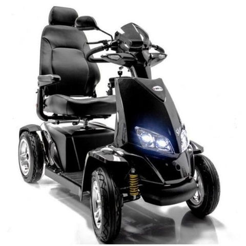 A silver bariatric scooter with headlights, front view.