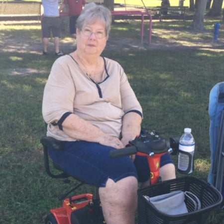 Old lady on Handyscoot Mobility Scooter