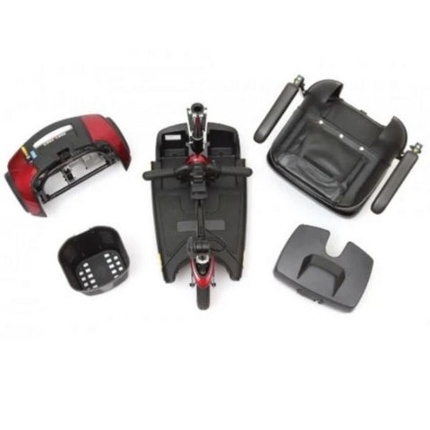 Image: A disassembled view of the Pride Go-Go Elite Traveller 3-Wheel Scooter. The scooter is shown in pieces, highlighting its compact design and easy portability.