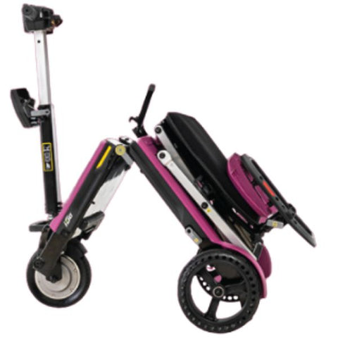 A folding mobility scooter in vibrant colors, designed for easy transportation and maneuverability.