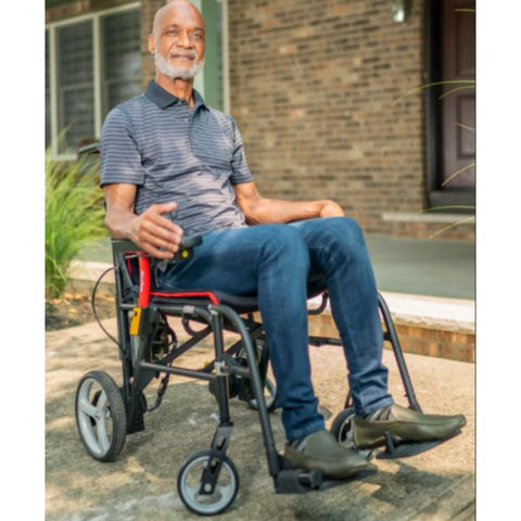 Man sitting on the Feather Ultra Lightweight Powerchair Front-Right View