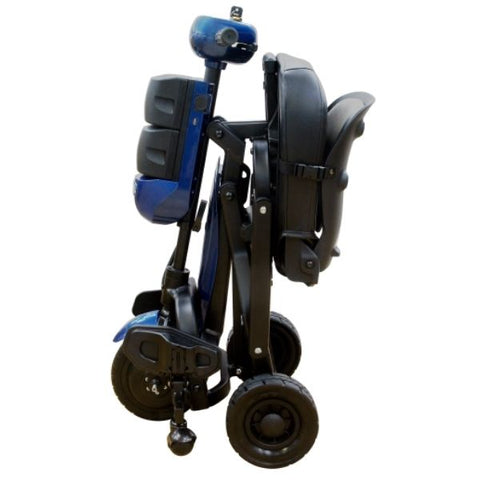 A foldable electric mobility scooter, designed by V8 iLiving, is shown in the image. The scooter is folded and compact, making it easy to store and transport. It features a sleek design with a black frame and red accents. The scooter is equipped with handlebars, a seat, and wheels for mobility.