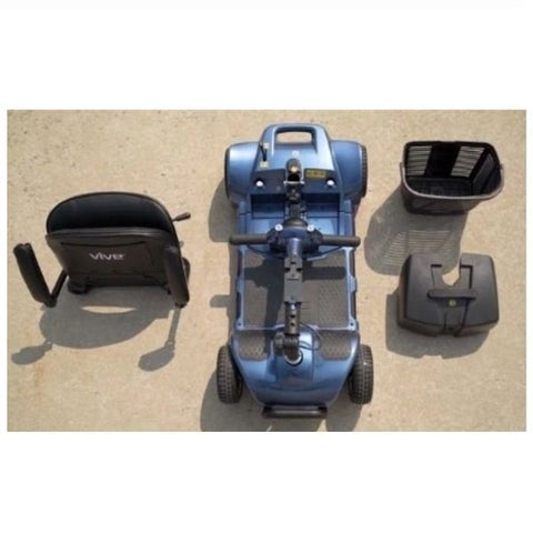 Image of a Vive Health 4-Wheel Mobility Scooter, disassembled into four lightweight parts. The scooter is designed for easy transportation and maneuverability.