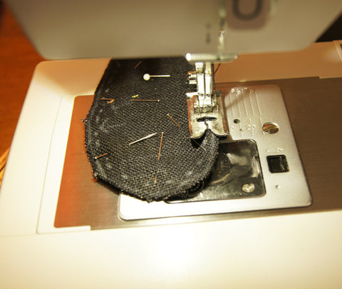 stitching around marked seam alowance with sewing machine