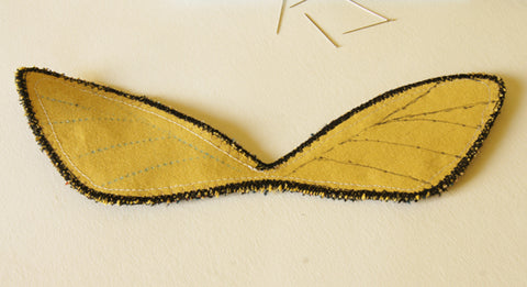 both upper wings with their vein marking finished