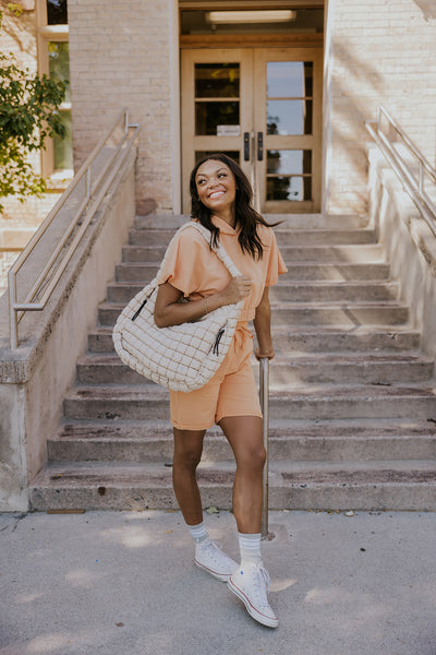 model using athleisure accessories