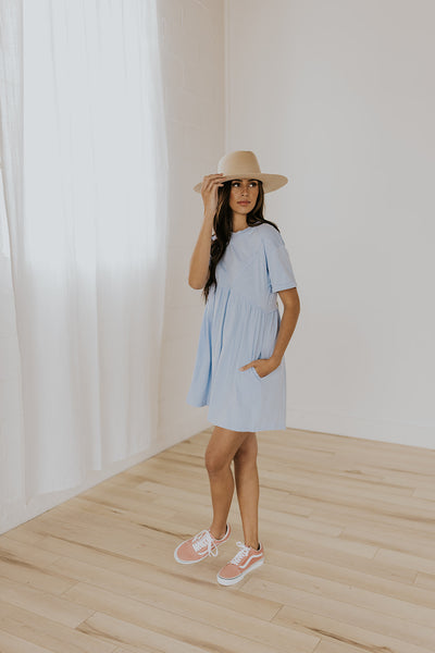 Woman wearing a blue t-shirt dress for the 4th of July