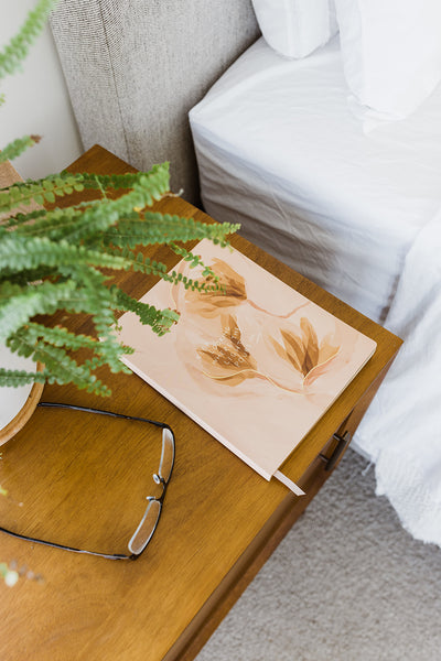 journal on a nightstand