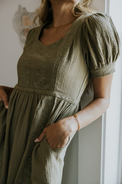 model wearing a gauze dress perfect for wedding receptions