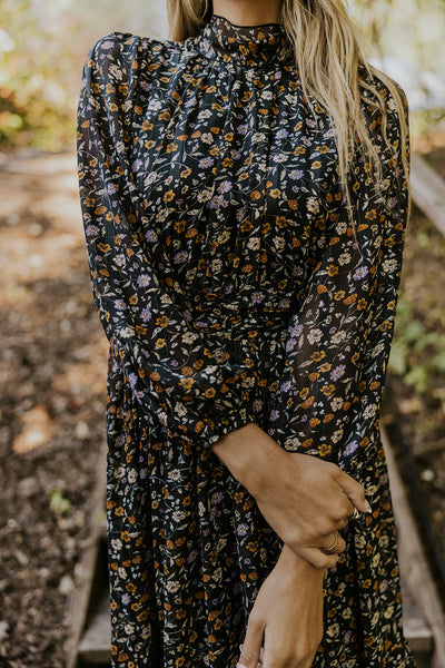 model wearing a floral dress