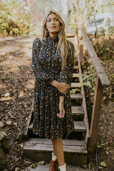 model wearing a floral dress