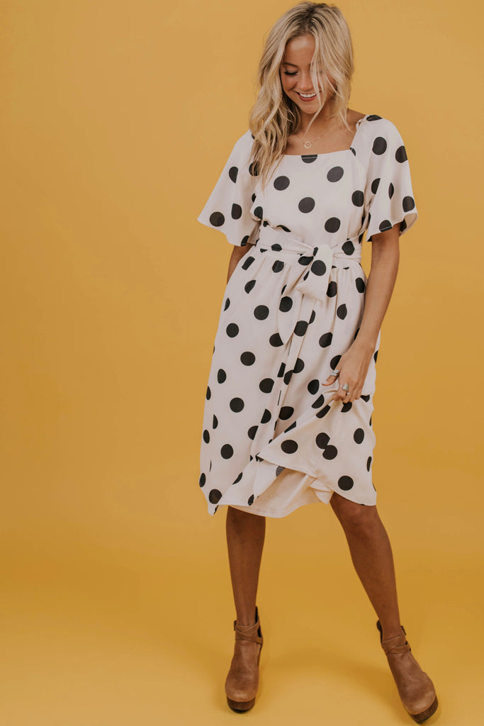 long white dress with black polka dots