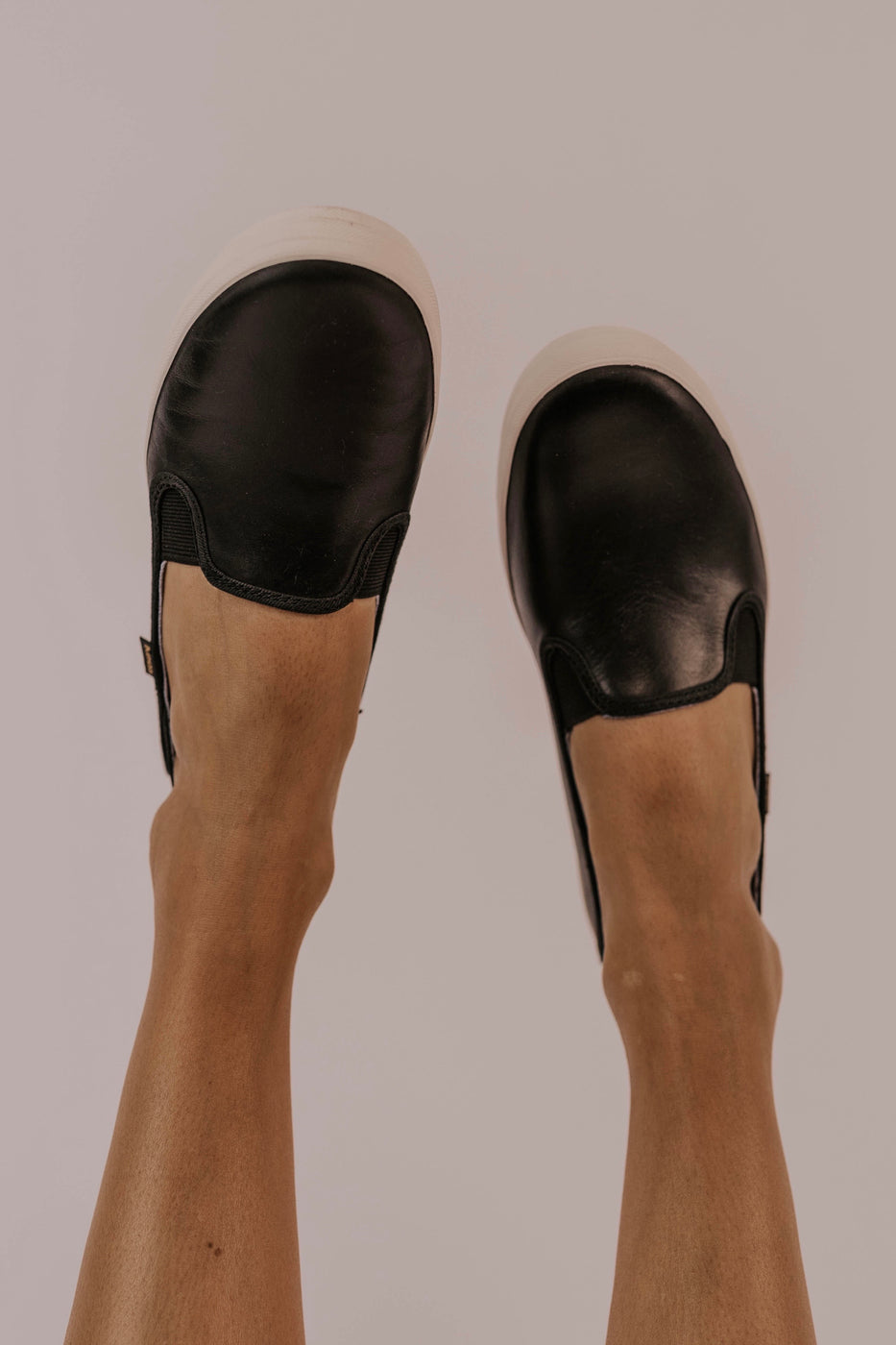 keds black leather slip on