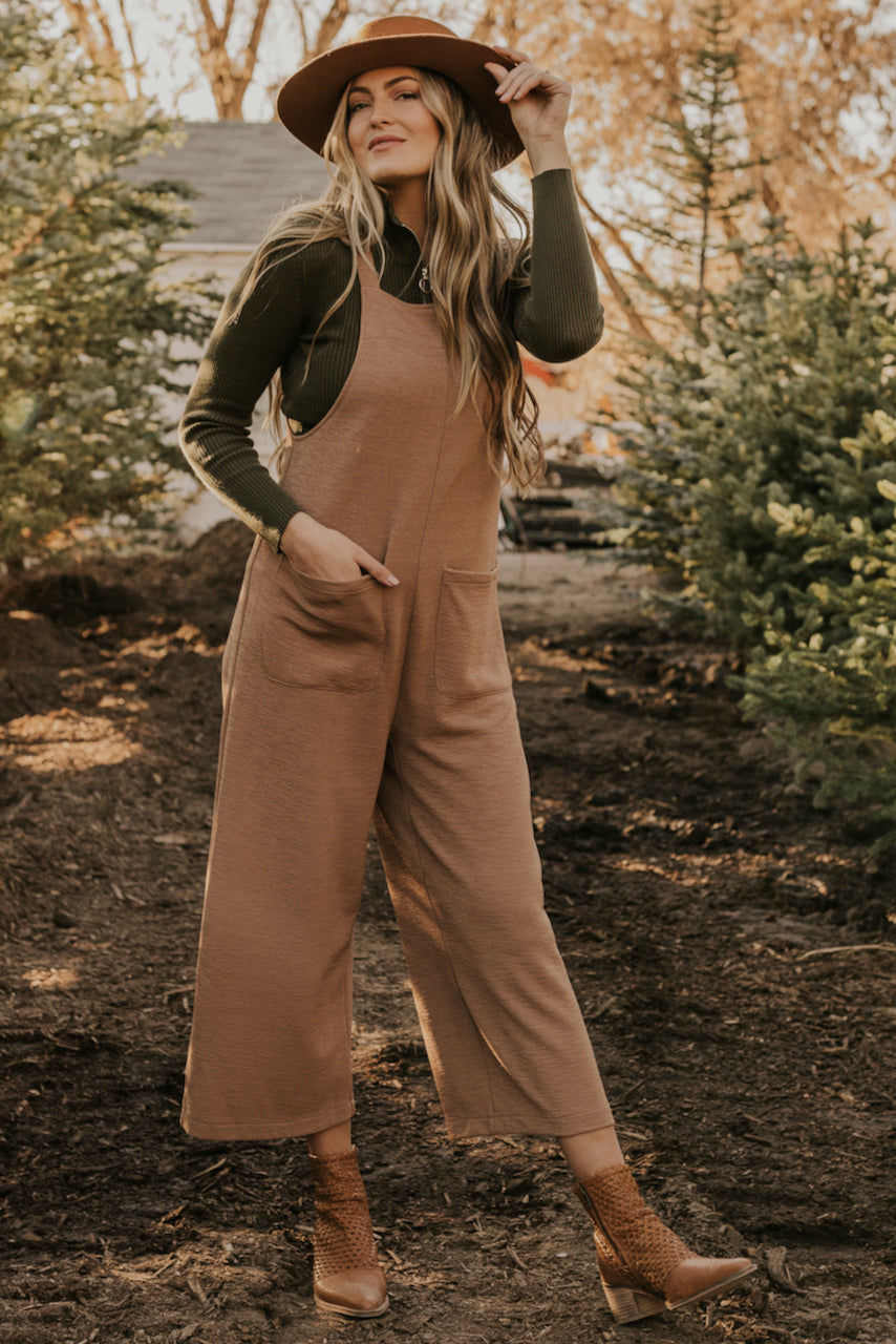 sleeveless jumpsuit in winter