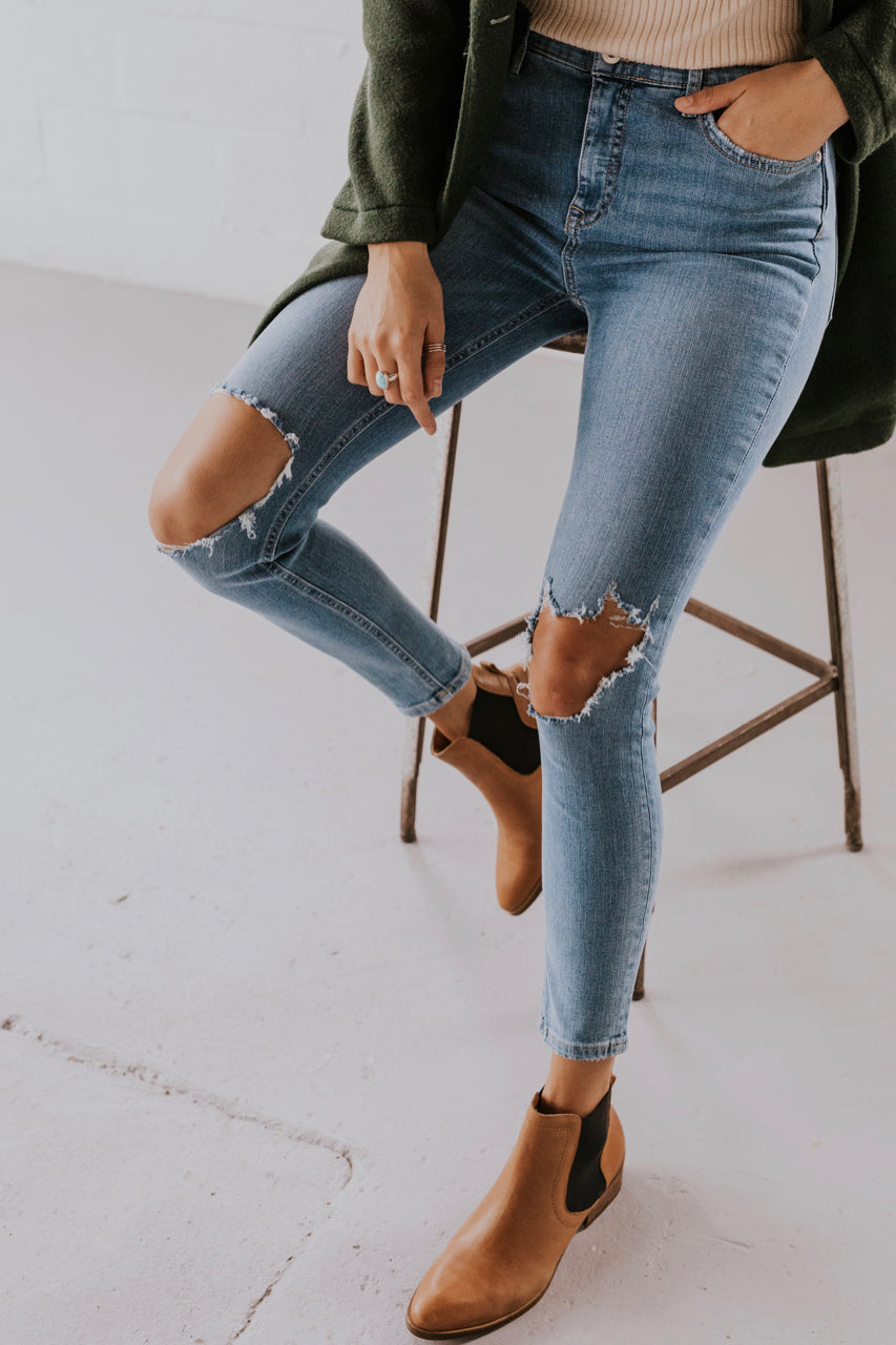 high rise busted knee skinny jeans