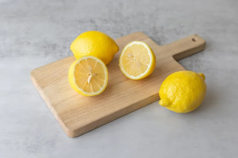 Lemons Cut On A Cutting Board For Making Alkaline Water