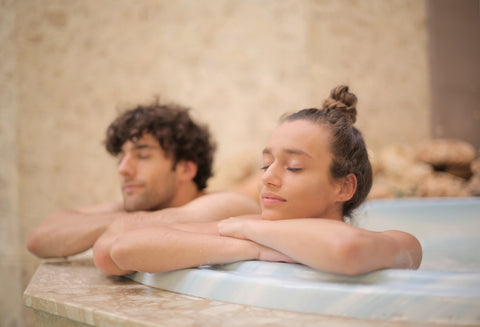 couple at a spa enjoying the jacuzzi