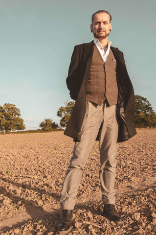 man stood in field wearing men autumn wear and brogue billy boot