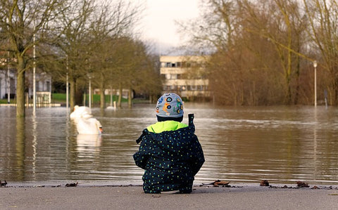 Standing in flood waters