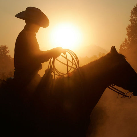 man in cattleman cowboy hat