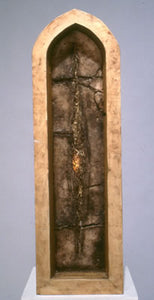 Straw. wood, stitched smoke-fired clay, straw, light. 28″x8″x4,” 2001