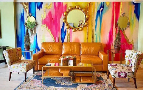 Maximalist living room interior design concept with colorful abstract wallpaper from Vivian Ferne.